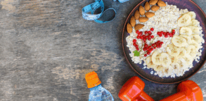 healthy-breakfast-bowl-with-water-and-weights